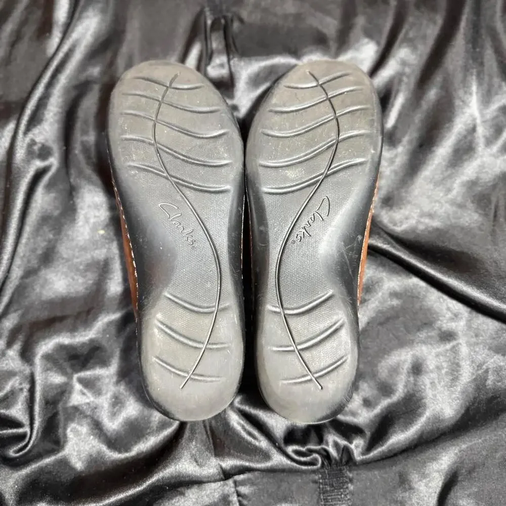 Brown leather clarks loafers